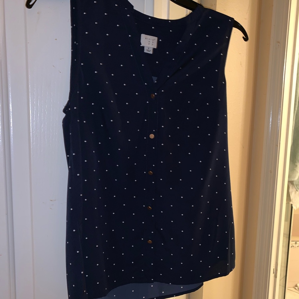 New blue and white sleeveless blouse